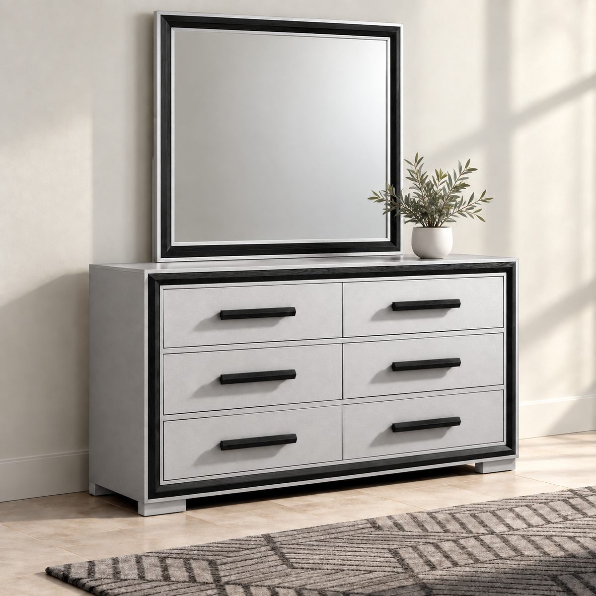Amelia silver and black dresser and mirror — full lifestyle view with one potted plant
