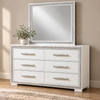 Andros glossy white and silver dresser and mirror — full lifestyle view with one potted plant