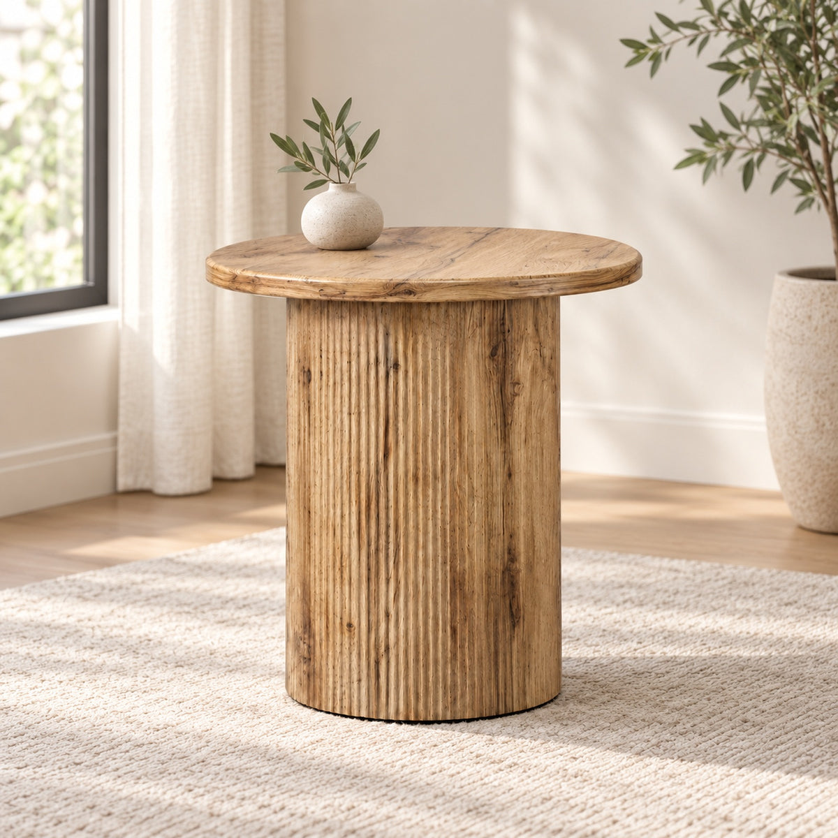 Modern Natural Wood Round End Table with Fluted Pedestal Base in a minimal living room