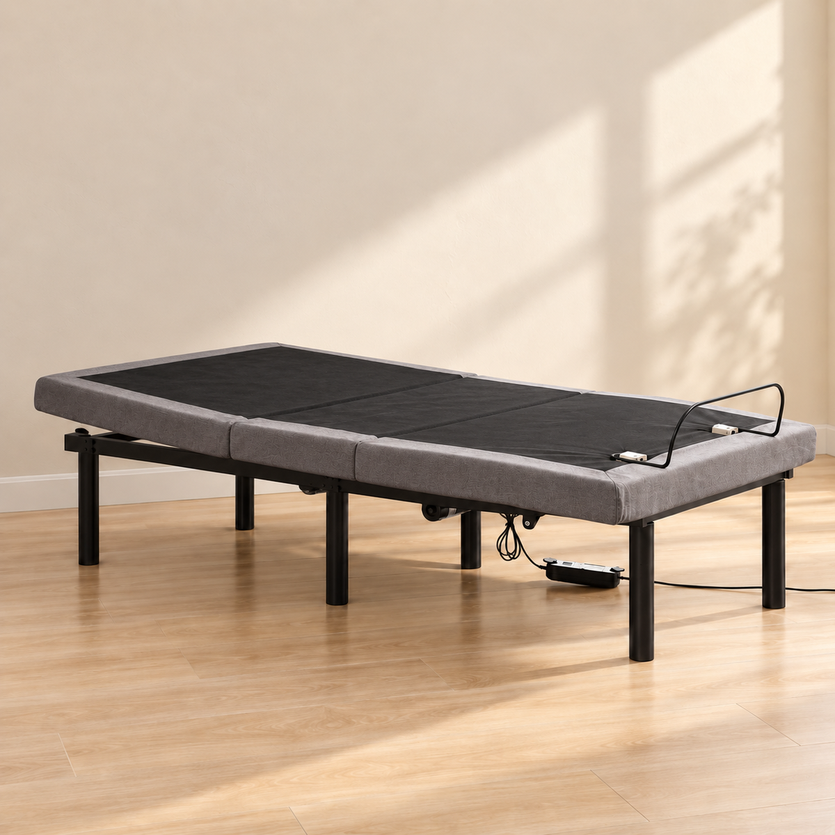 Deluxe electric adjustable bed base — flat position lifestyle view, base only