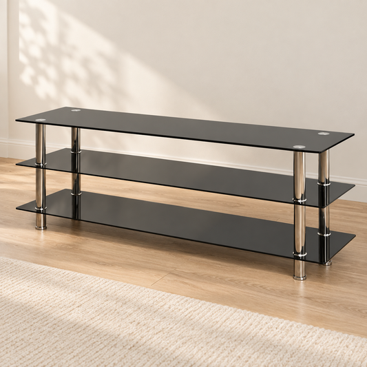 Black tempered glass and chrome 60-inch TV stand in a warm living room, with no TV