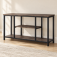 Distressed wood and black metal 48-inch TV stand in a warm living room, with no TV