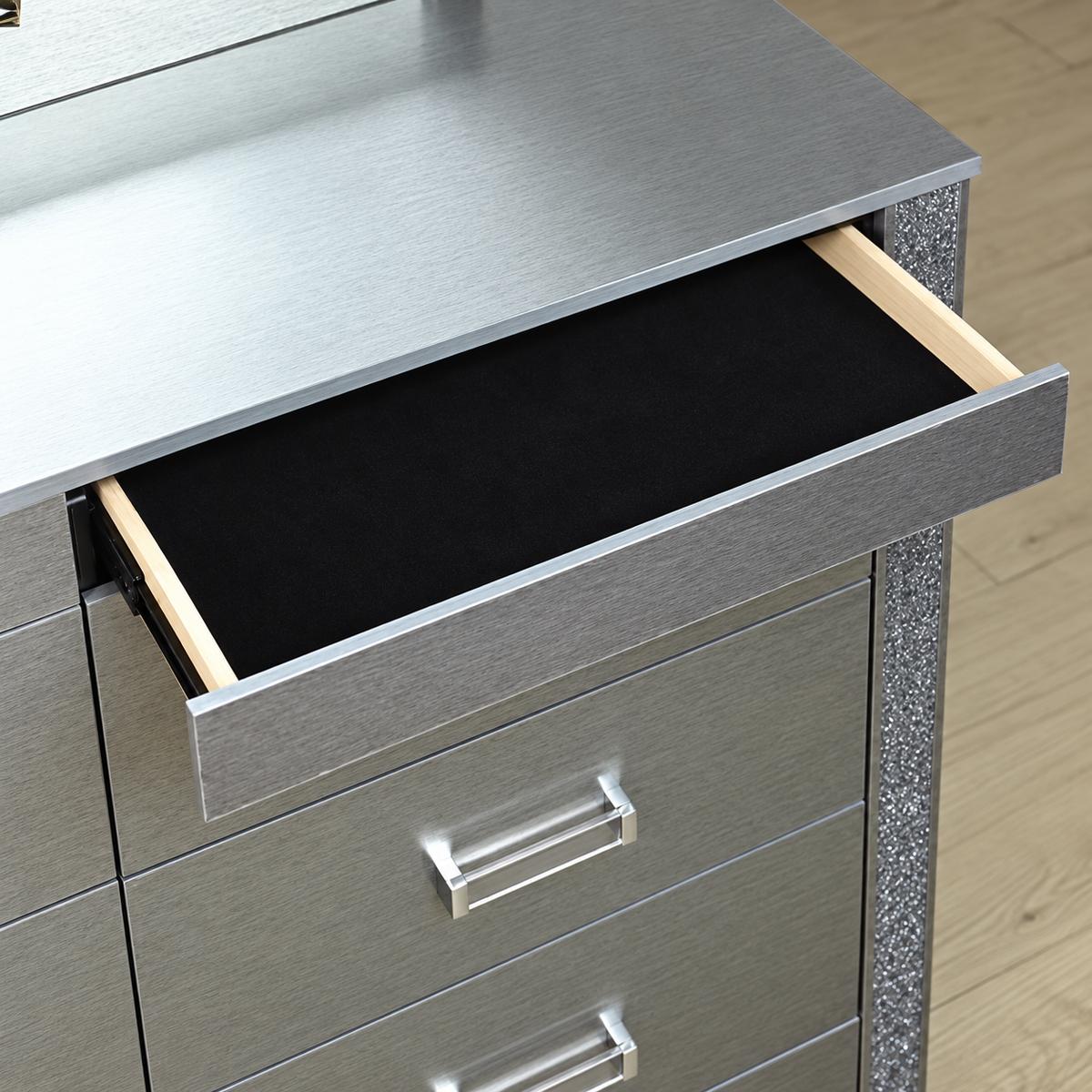 Logan silver dresser — open hidden jewelry drawer with black lining and crushed-crystal side trim