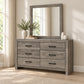 Charlotte Black dresser and mirror in a bedroom lifestyle setting
