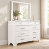 Jordyn White dresser and mirror in a bedroom lifestyle setting