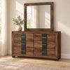 Optimus Grey dresser and mirror in a bedroom lifestyle setting