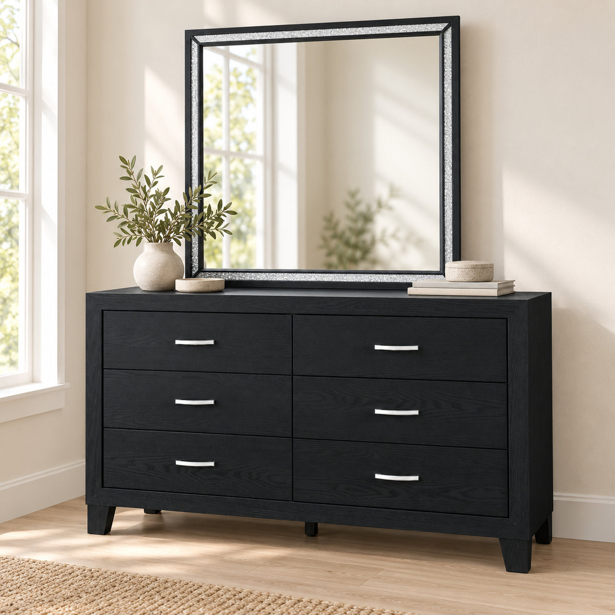 Reid Black dresser and mirror in a bedroom lifestyle setting